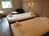 Postel nebo postele na pokoji v ubytování Hotell Stinsen