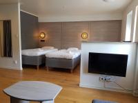 Postel nebo postele na pokoji v ubytování Hotell Stinsen