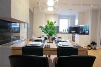 Kuchyňa alebo kuchynka v ubytovaní Słoneczne Tarasy II - Apartments