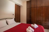 A bed or beds in a room at Villa Gogo offers privacy and pool