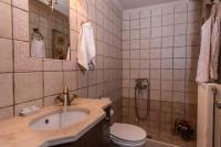 A bathroom at Villa Gogo offers privacy and pool