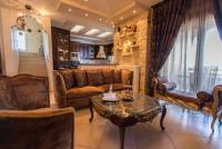 A seating area at Villa Gogo offers privacy and pool