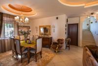 A seating area at Villa Gogo offers privacy and pool