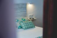 Postel nebo postele na pokoji v ubytování Hotel Avenida Playa