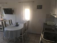 Kuchnia lub aneks kuchenny w obiekcie Apartments Maleo