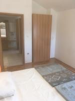 Łóżko lub łóżka w pokoju w obiekcie Apartments Maleo
