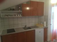 Kuchnia lub aneks kuchenny w obiekcie Apartments Maleo