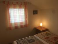 Łóżko lub łóżka w pokoju w obiekcie Apartments Maleo