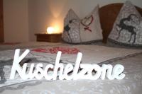 a close up of a bed with the word nederland at Buchschneider - Ferienhaus Maier - Landhof in Schwarzautal