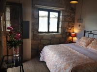 Cama o camas de una habitación en Huerto San Antonio
