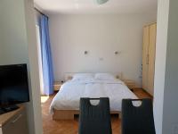 Posteľ alebo postele v izbe v ubytovaní Apartments Jurandvor