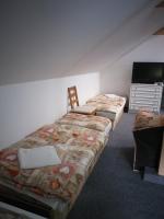 Postel nebo postele na pokoji v ubytování Vila Terezie