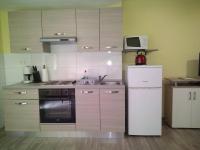 Kuchyňa alebo kuchynka v ubytovaní Apartman Salvia