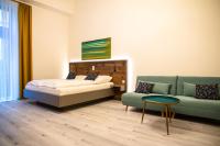 Postel nebo postele na pokoji v ubytování City Hotel Bamberg