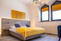 Postel nebo postele na pokoji v ubytování City Hotel Bamberg