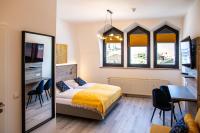 Postel nebo postele na pokoji v ubytování City Hotel Bamberg