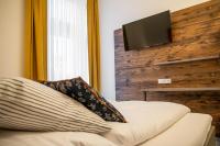 Postel nebo postele na pokoji v ubytování City Hotel Bamberg