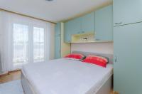 Posteľ alebo postele v izbe v ubytovaní Apartments Pela