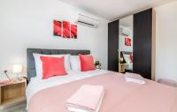 Posteľ alebo postele v izbe v ubytovaní Modern Apartments Elle Malinska