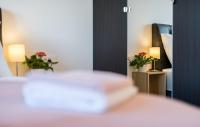 Posteľ alebo postele v izbe v ubytovaní Modern Apartments Elle Malinska