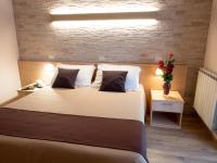 Albergo Ristorante il Fungoにあるベッド