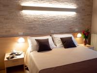 Albergo Ristorante il Fungoにあるベッド