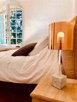 Ein Bett oder Betten in einem Zimmer der Unterkunft Villa Agrippa