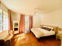 Ein Bett oder Betten in einem Zimmer der Unterkunft Villa Agrippa