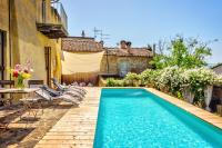 The swimming pool at or close to Borgo Marcena