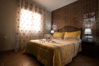 A bed or beds in a room at Casa Manel, La Gomera