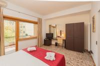Posteľ alebo postele v izbe v ubytovaní Hotel Piazza Marconi