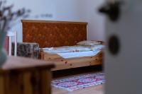 Posteľ alebo postele v izbe v ubytovaní Kápolna Vendégház