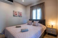 Posteľ alebo postele v izbe v ubytovaní Big Blue suites 2