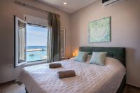 Posteľ alebo postele v izbe v ubytovaní Big Blue suites 2