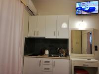 Kuchyňa alebo kuchynka v ubytovaní Spiros Rooms