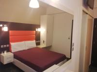 Posteľ alebo postele v izbe v ubytovaní Spiros Rooms