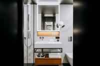 Łóżko lub łóżka w pokoju w obiekcie Nobu Hotel Warsaw