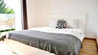 Posteľ alebo postele v izbe v ubytovaní Zielone Apartamenty Katowice Chorzów