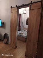 Postel nebo postele na pokoji v ubytování Dharma Luxury & Spa Apartment