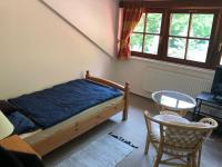 Postel nebo postele na pokoji v ubytování Malá Svatá Hora - penzion & restaurace