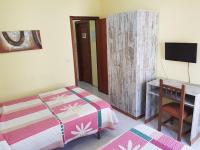 A television and/or entertainment centre at Hostal Virgen Del Rocío