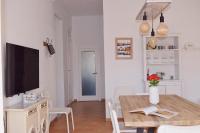 TV a/nebo společenská místnost v ubytování Valencia Apartamentos Goya