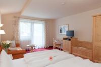 Telewizja i/lub zestaw kina domowego w obiekcie Hotel Garni Rifflsee