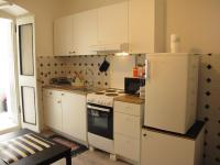Kuchyňa alebo kuchynka v ubytovaní Studio apartman "Arna"