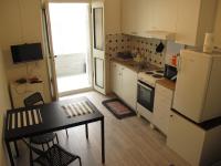 Kuchyňa alebo kuchynka v ubytovaní Studio apartman "Arna"