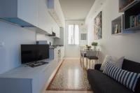 Televízia a/alebo spoločenská miestnosť v ubytovaní Biennale Apartments Venice
