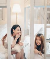 Ein Bett oder Betten in einem Zimmer der Unterkunft Noursabah Boutique Bed Bangkok