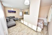 Posedenie v ubytovaní Panoráma City Apartman