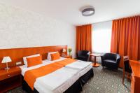 Łóżko lub łóżka w pokoju w obiekcie Parkhotel Plzen Congress Center