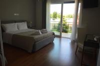 Posteľ alebo postele v izbe v ubytovaní B&B La Rosa dei Venti